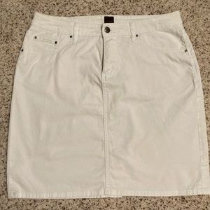 White denim skirt. No stains. Length is 20.5 inches. Waist measures. 34 inches.